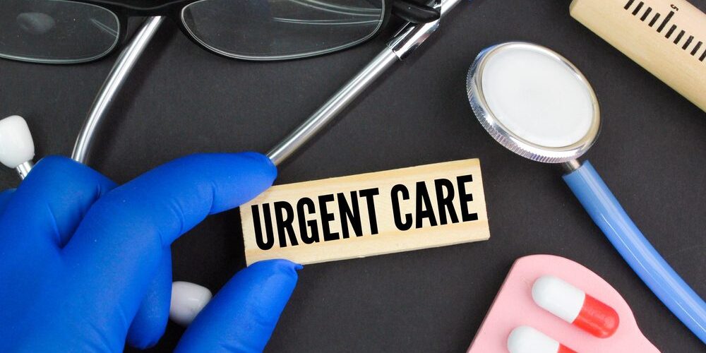 Stethoscope,,Medicine,Shape,,Needle,Shape,And,Hand,Holding,The,Word Same Day Urgent Care In Shelby Township Michigan